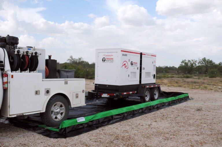 UltraTech collapsible-wall containment berm around a generator and truck