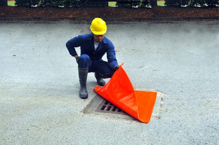 UltraTech drain seal being placed over a drain